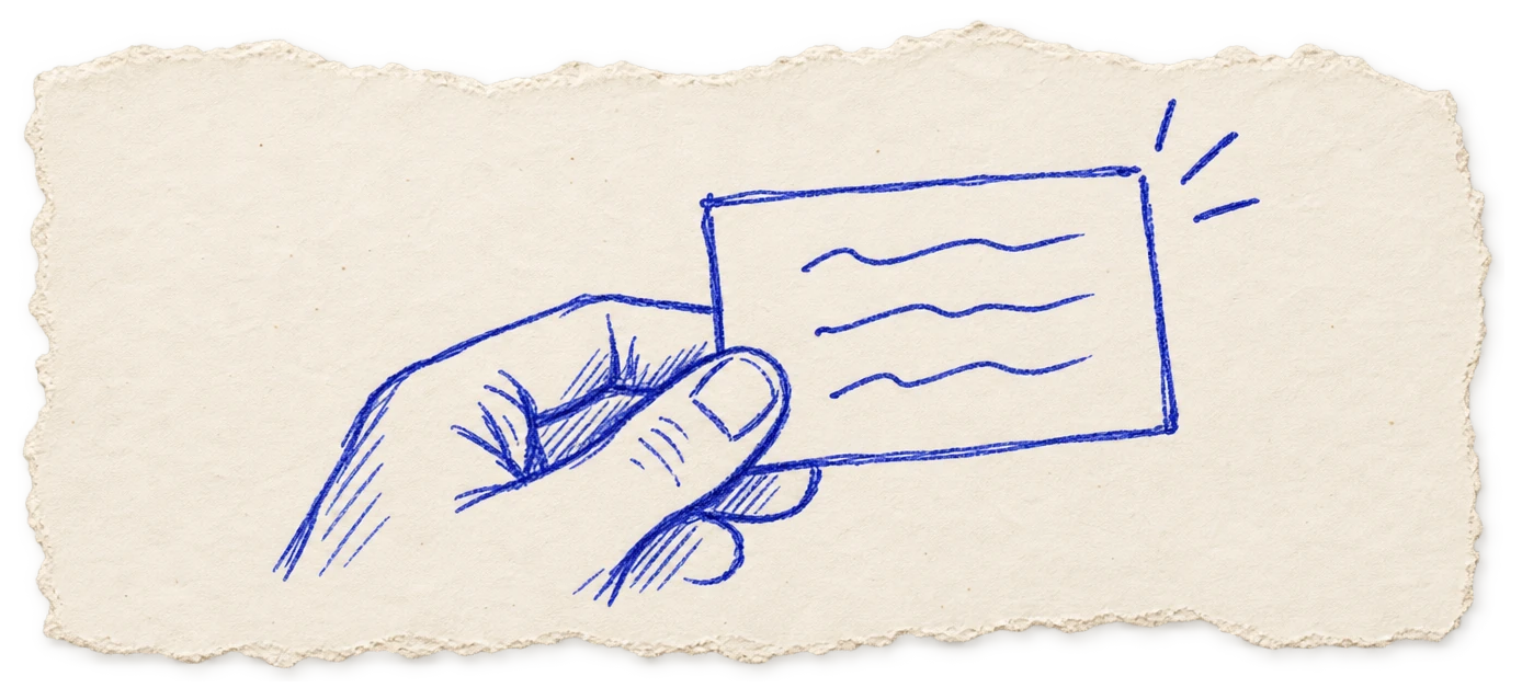 Sketch: a hand holds up the note card.
